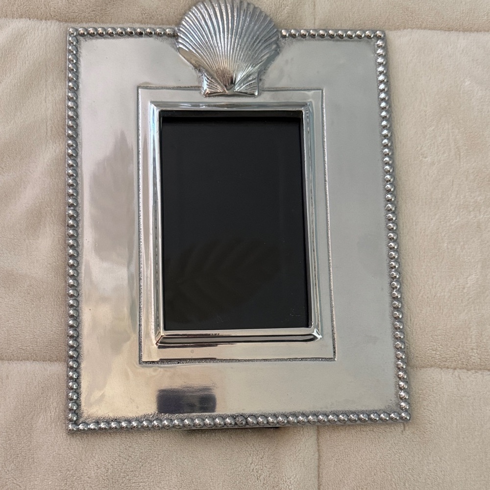 Beautiful silver tombed shell frame, 8” x 10”